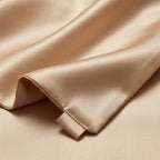 Rose Gold Silk Pillowcase with Unique Necktie Draping Detail